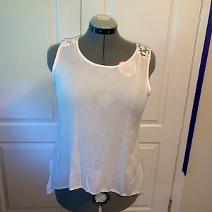 Flowy white tank top. Lace designed back. Tag on.